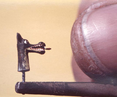 Ralph Preson's "pet dragon", Fafnir, about 3/4's the width of Ralph's thumb. Click for larger image.